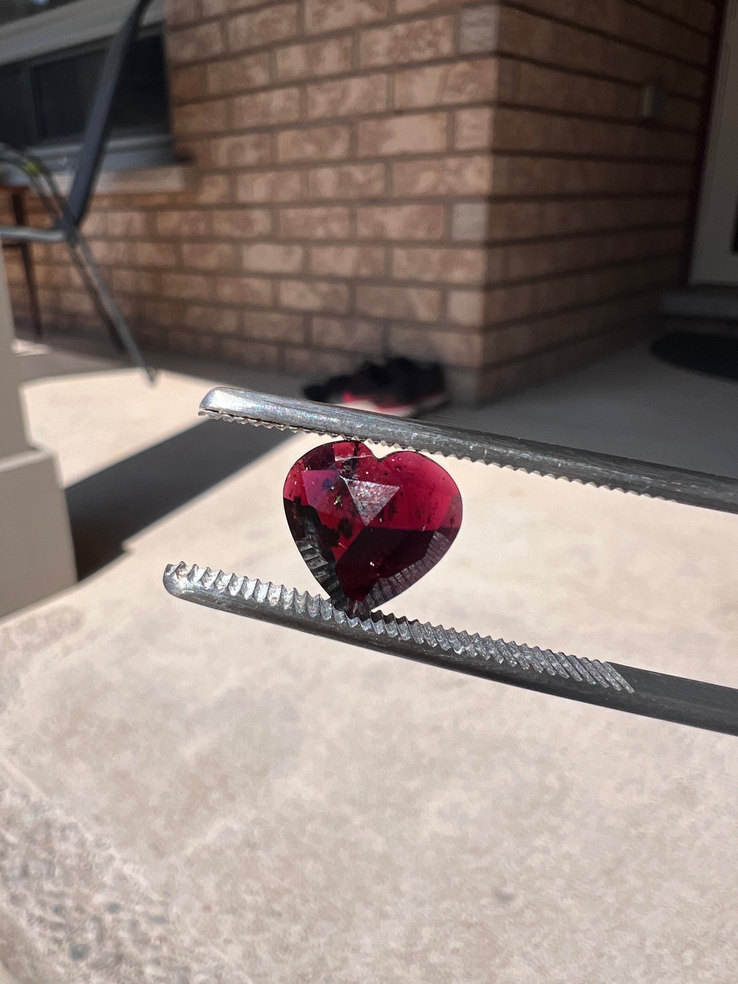 Faceted red garnet hearts