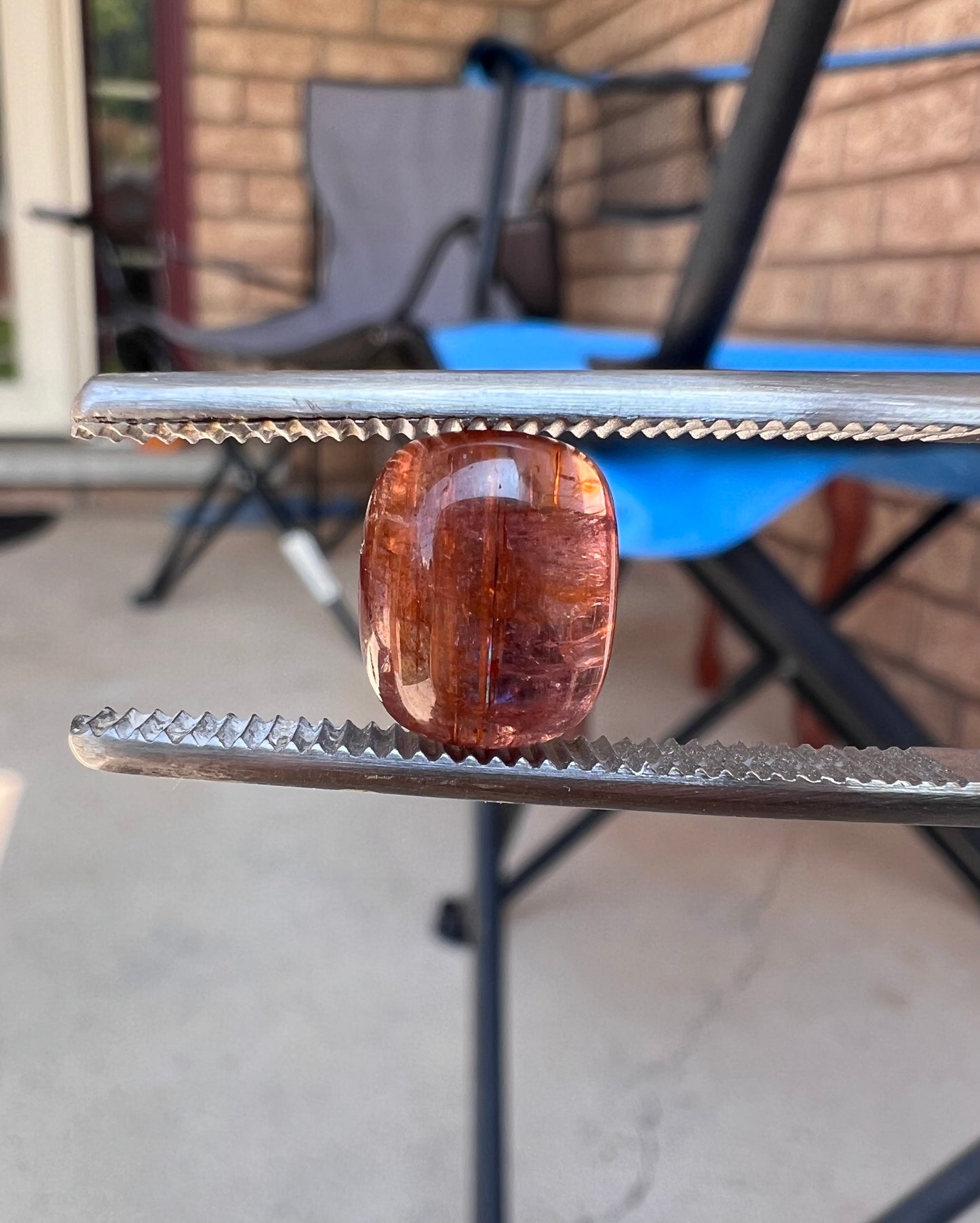 Pink/orange tourmaline cabochon