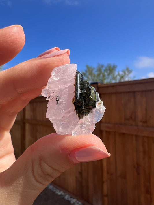 Crystallized rose quartz with green tourmaline