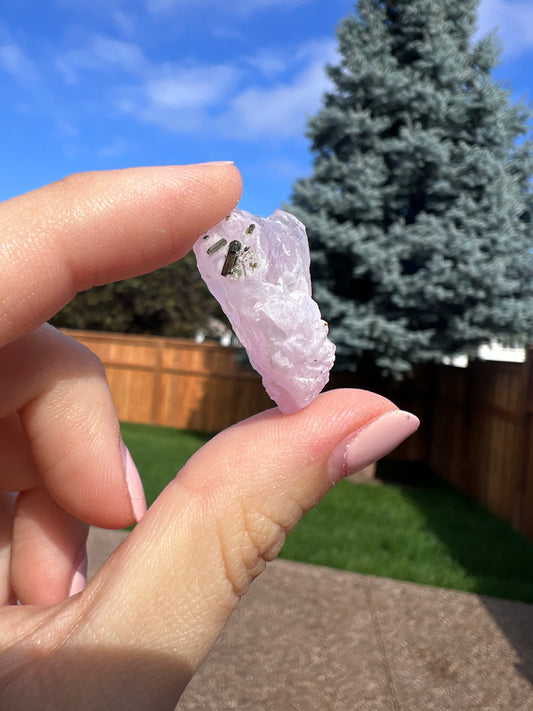 Crystallized rose quartz with green tourmaline