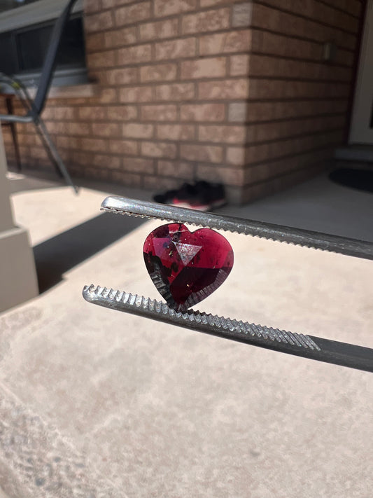 Faceted red garnet hearts