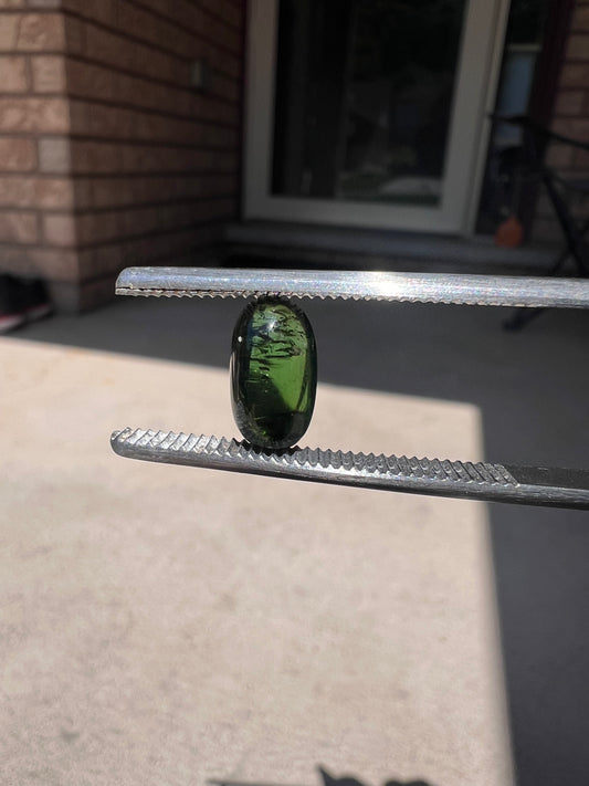 Olive green oval tourmaline