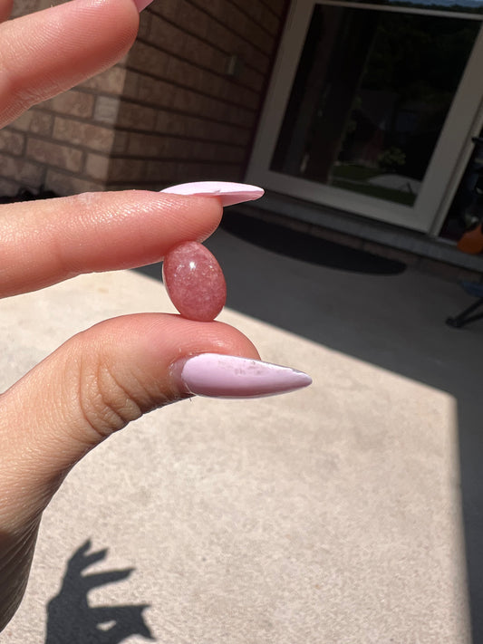 Oval rhodochrosite cabochon (B)
