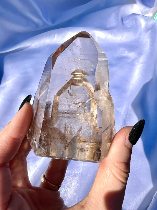 Half polished champagne quartz tower